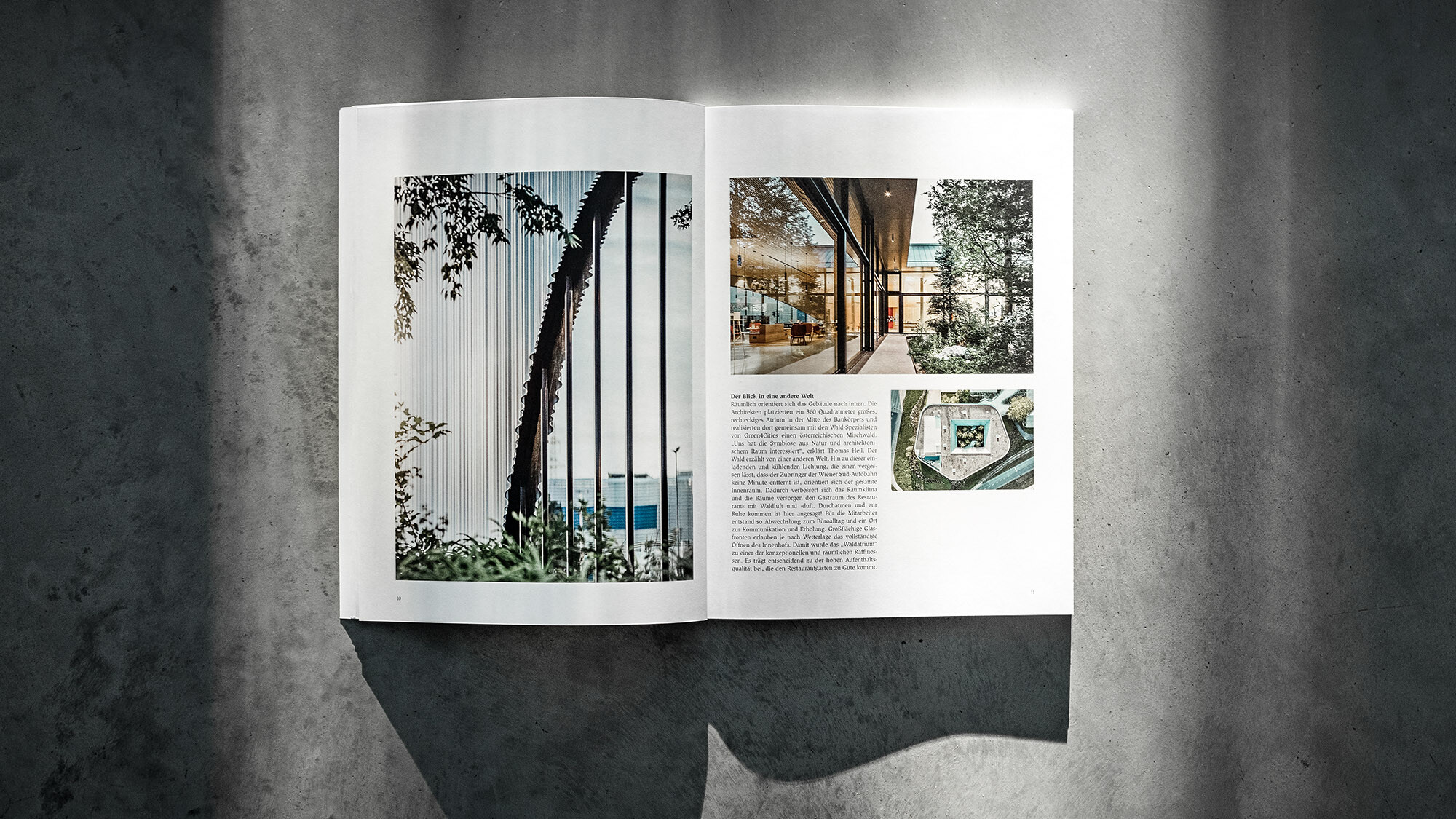 Otevřené vydání knihy PREFARENZEN 2024 s článkem o projektu Walters Restaurant od dreiplus architects na šedém pozadí