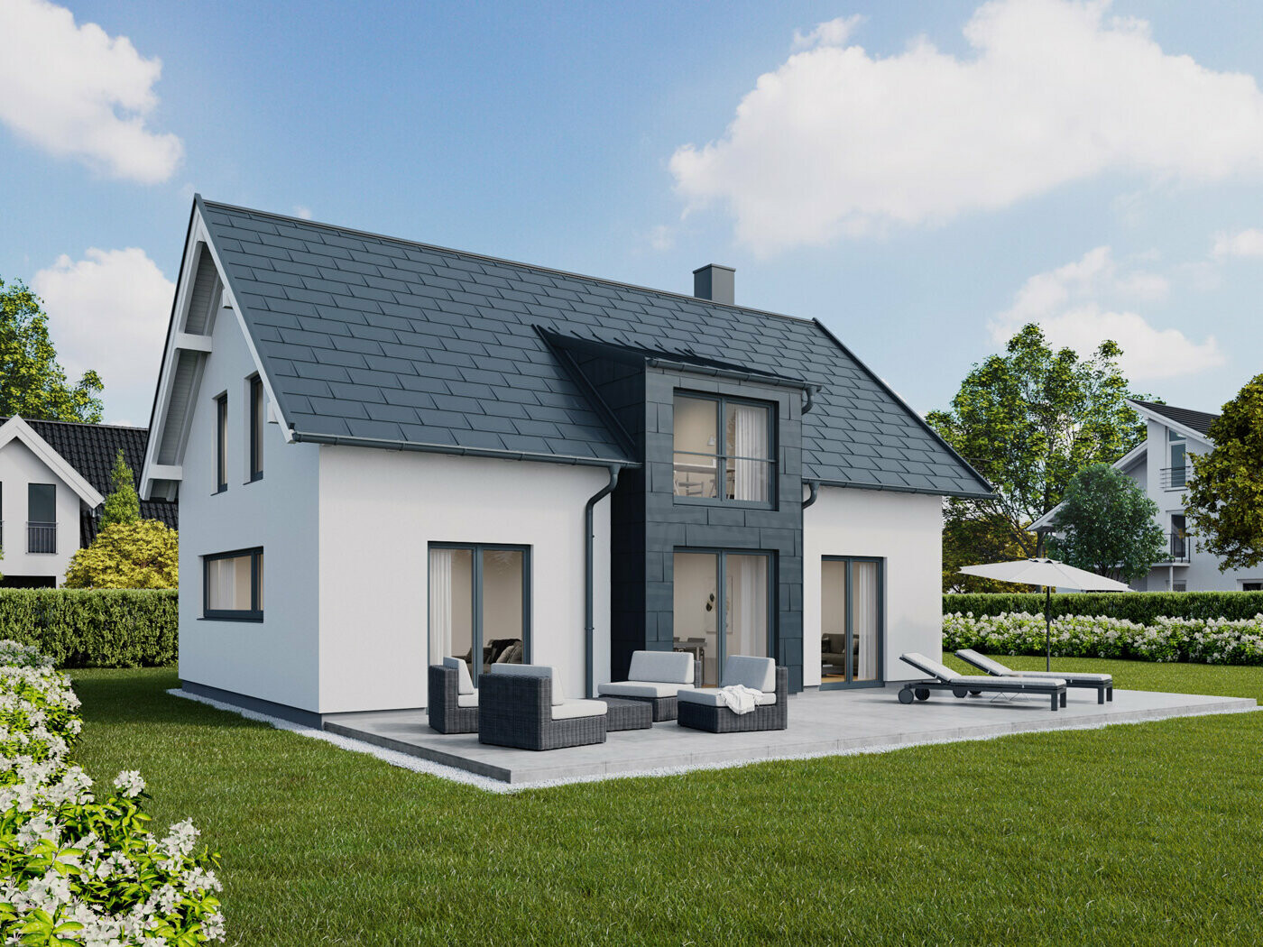 Einfamilienhaus mit Satteldach mit PREFA Dachplatten R.16 und Fassadenpaneelen FX.12 in P.10 Anthrazit 