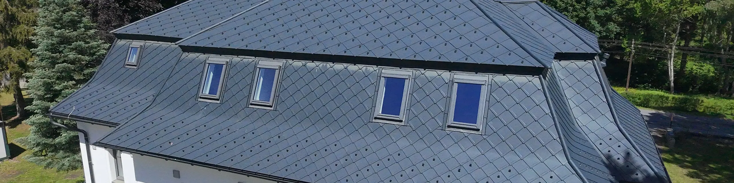 Falcované šablony PREFA 44x44 a 29x29 na zámečku v Jeseníkách