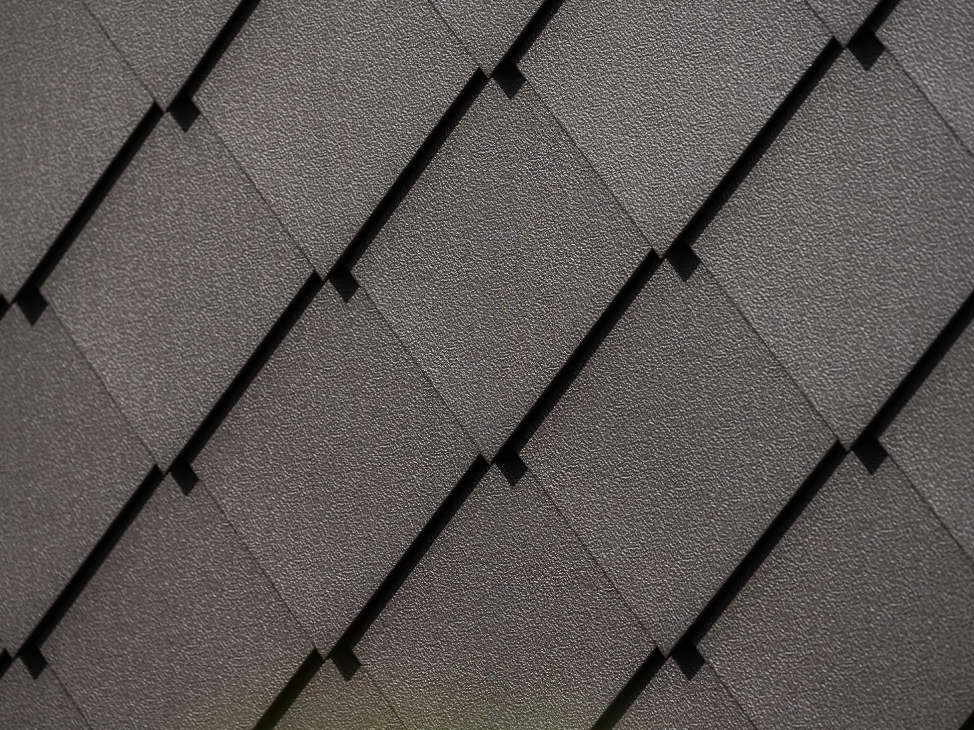 PREFA fasádní šablona 29 × 29 v oříškové barvě, detail povrchu stucco