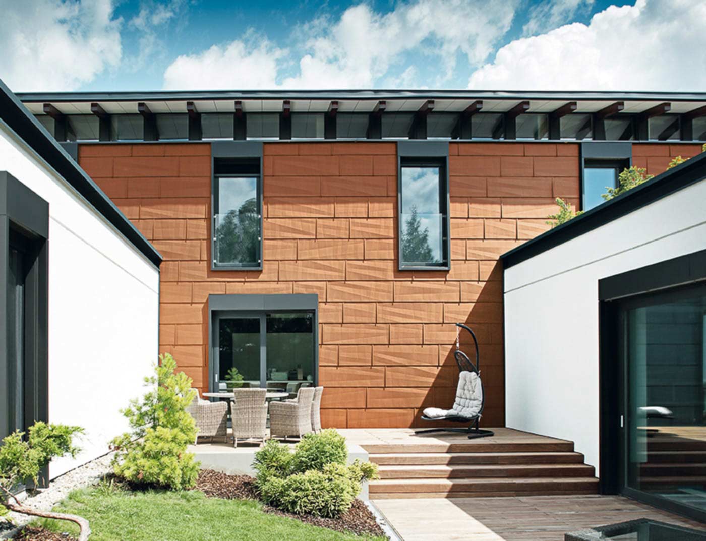 Referenční objekty PREFA Fasádní systémy Fasádní panel FX.12 04 P.10 cihlově červená